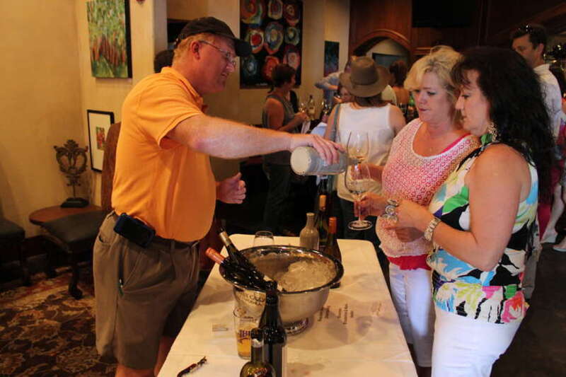 Wine Country Bistro and Bottle Shop on Line Avenue held its fourth annual "Wine and Swine" shindig on Sunday, April 22. As the event's name would suggest, the main attractions are wine - lots of varieties are available to sample - and pork cooked