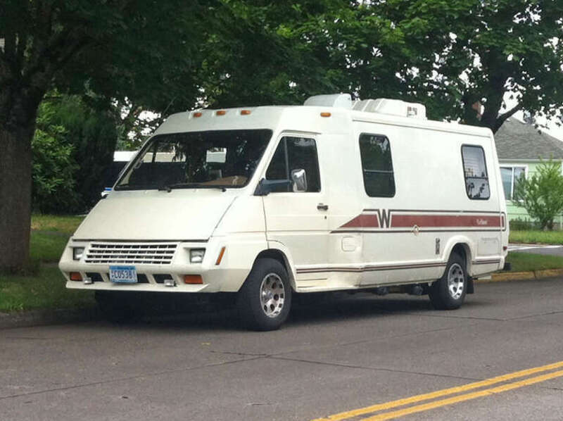 Winnebago Lesharo, late 80s model, parked on the street in Eugene Oregon