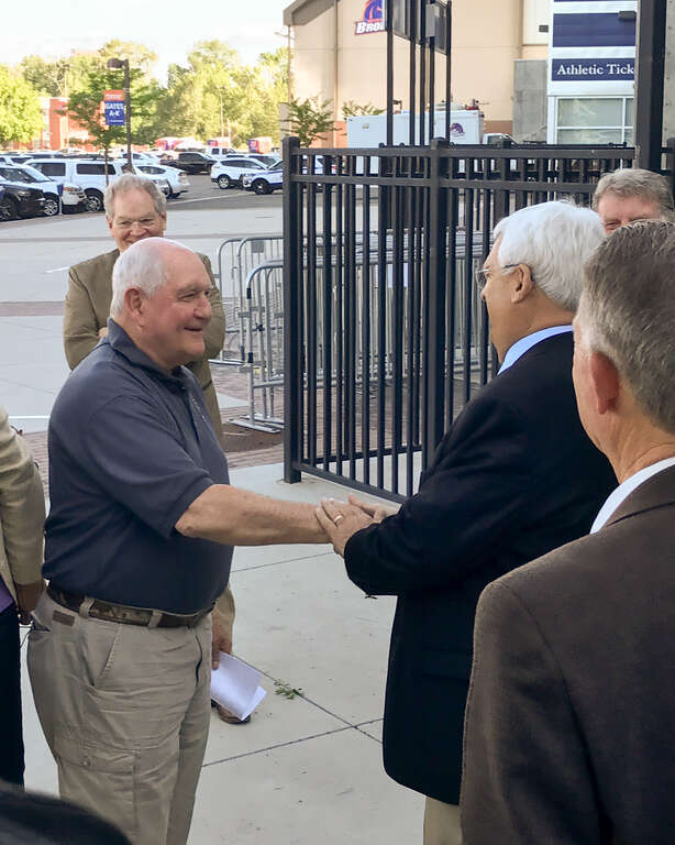 U.S. Department of Agriculture (USDA) Secretary Sonny Perdue, center, is welcomed to Boise State University (BSU) Stueckle Sky Center, by BSU Special Assistant for Government Relations to the BSU President Bruce Newcomb, on June 2, 2017.  USDA photo
