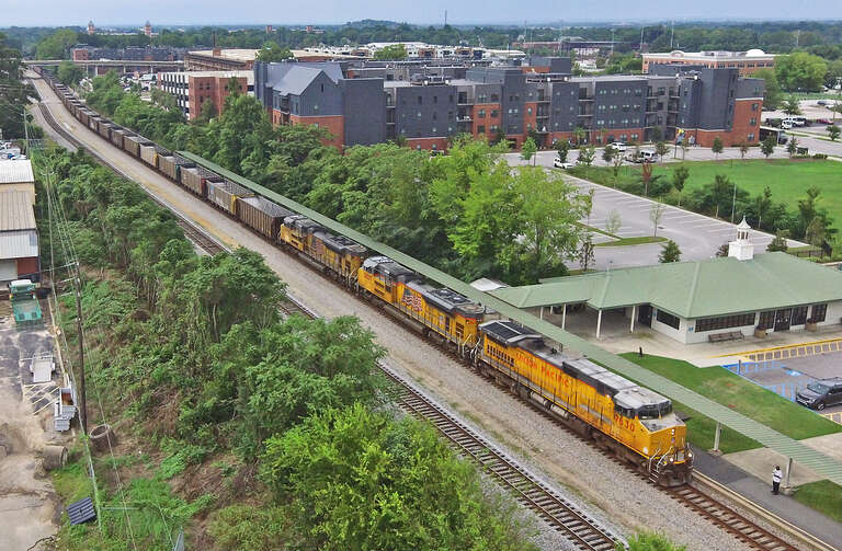 CSX W222-26 is northbound through The Ditch in Columbia, SC, heading for the CN&amp;L Subdivision.  Powering the train is a trio of Union Pacific motors consisting of a C44-9W, SD70AH, and SD70ACe.
