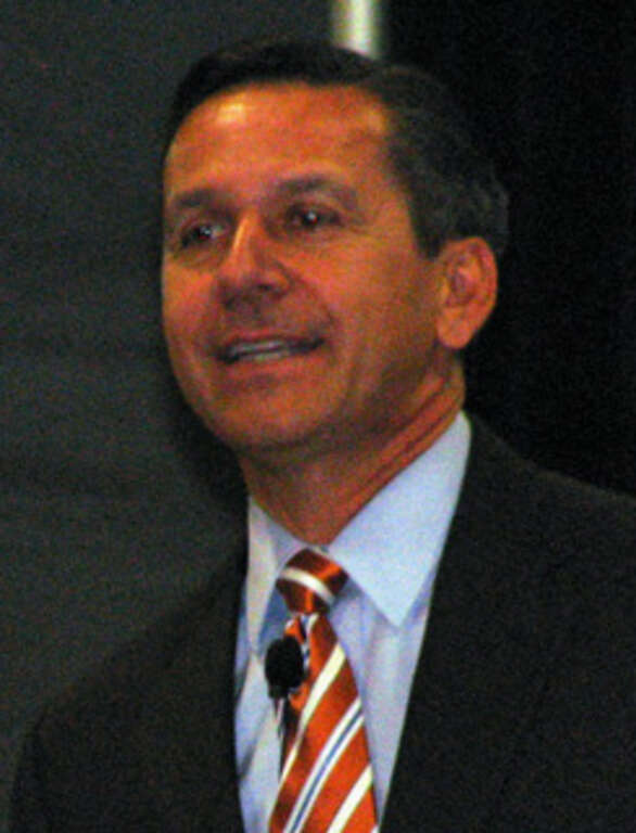 Good speech today from gubernatorial candidate Dino Rossi. Seems like a very humble, regular guy.
The lighting at TRAC was awful, and I was a bit too far away to get any real good pix, so this one (and the other) have been cleaned up as much as