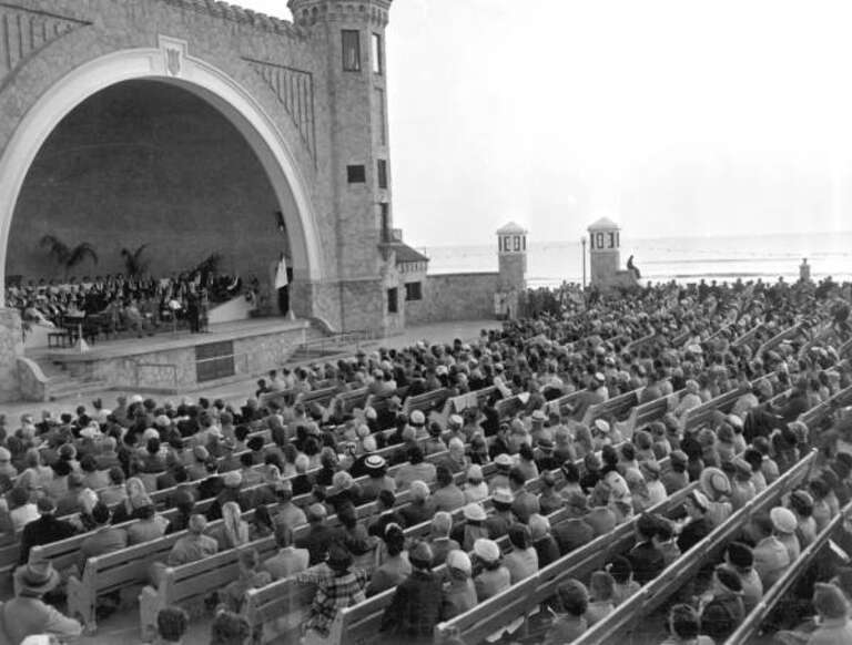 Local call number: C017773
Title: Easter Service at the Daytona Beach Bandshell
Date: April 1953
General Note: Built of coquina, the Daytona Beach Bandshell was completed by the Works Progress Administration in 1937. It was added to the National