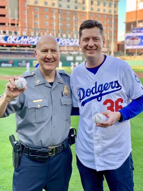 Oklahoma City Mayor David Holt (right) with MSgt. Knight of the Oklahoma City Police Department (left) threw out the first pitches for the Oklahoma City Dodgers season opener on April 4, 2019.