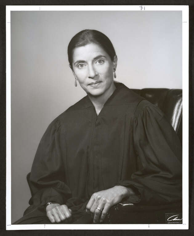 Photograph (front side) portrait of the Honorable Ruth Bader Ginsburg, U.S. Court of Appeals and 1981 John A. Sibley Lecturer. The title of her lecture was "Inviting Judicial Activism: A 'Liberal' or 'Conservative' Technique" and was delivered at the