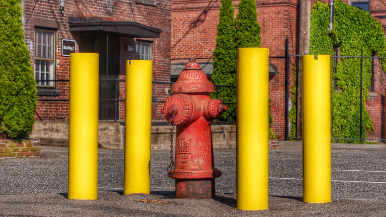 
500px provided description: Standing Tall [#yellow ,#fire hydrant ,#Popular Tags]
