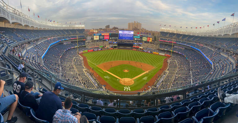 A picture of Yankee Stadium during a game between the Yankees and Pirates.
