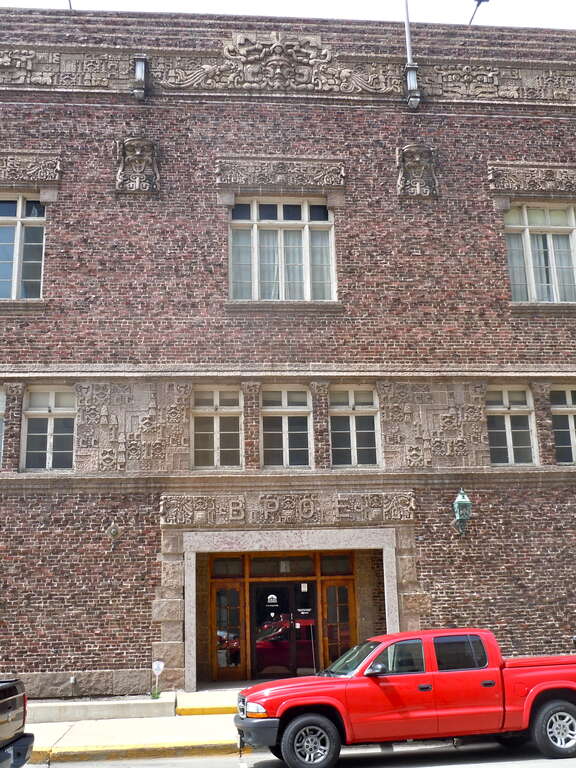 Aurora Elks Lodge No. 705 on the NRHP since March 31, 1980	. At 77 S. Stolp Ave.,	Aurora, Kane County Illinois.  On Stolp Island and a contributing structure in the Stolp Island Historic District.  A very odd building built with "clinker bricks"