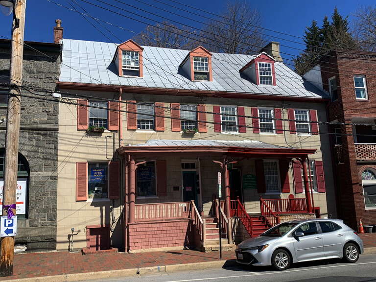 Description from the plaque on the building: "Disney's Tavern Ca 1790 Deborah Disney ran her tavern, a popular gathering place for men, on this site from 1840-1862. The building continued as a tavern throughout the late 19th century. Later a fabric