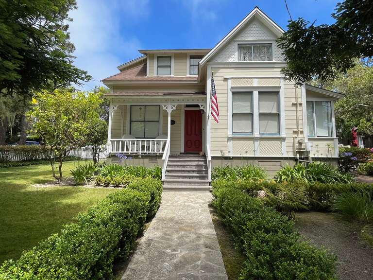 The Abbie Jane Hunter House is a historic one-and-one-half story wood-framed Queen Anne style residence, located on the northeast corner of 4th Avenue and Guadalupe Street in Carmel-by-the-Sea. The house was designed by Douglas Knox Friser and built