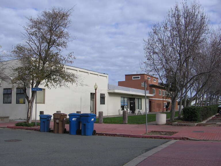 Alano Club in Antioch, California.  This row of buildings sits adjacent to the former AT&amp;SF tracks along the river in Antioch.  They lie to the east of I Street from the Amtrak station (The Amtrak station is to the west of I Street).