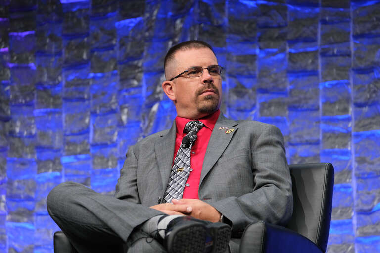 Wyoming State Representative Marshall Burt speaking on a panel at FreedomFest 2021 at the Rushmore Plaza Civic Center in Rapid City, South Dakota
