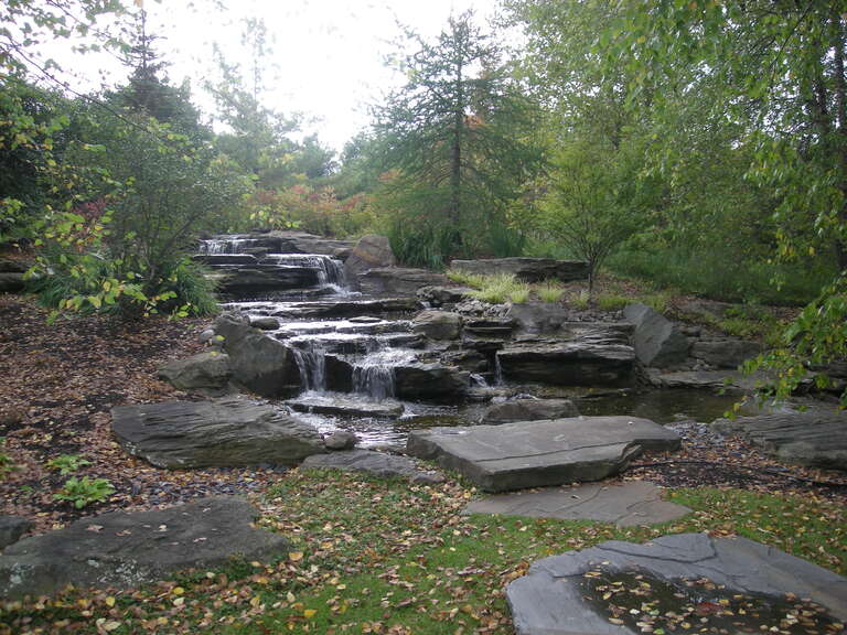 The waterfall in the Sculpture Park at the Frederik Meijer Gardens &amp; Sculpture Park in Grand Rapids Township, Michigan (United States).