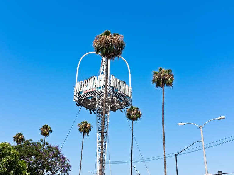 Old Norwalk Town Square Shopping Center sign in Norwalk, California at the intersection of Pioneer and Rosecrans
