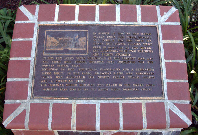 This plaque resides out from of San Ramon Valley High School and has a brief run down of the school's early history. Text of the plaque as follows: "In August of 1910 the San Ramon Valley Union High School District Was Formed. For the first six years