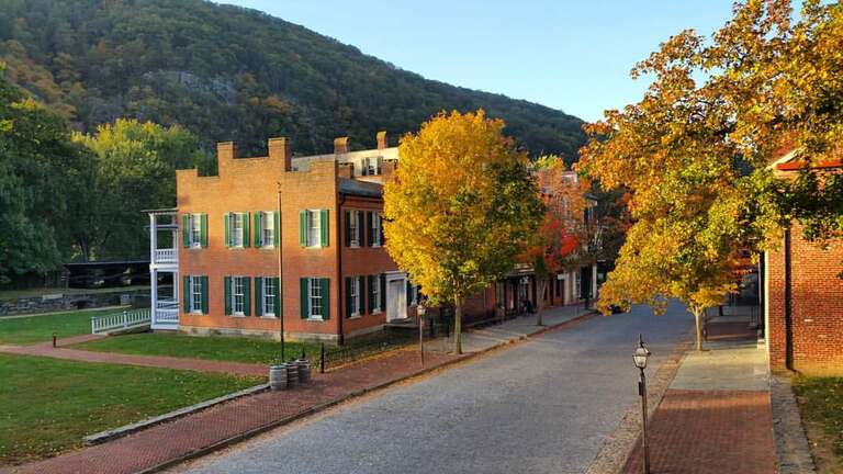 On this quiet fall morning, eagles are flying over Shenandoah St., and landing on the Loudoun Heights cliffs. #harpersferry #harpersferrynps #ColorWatch2015 #FindYourPark