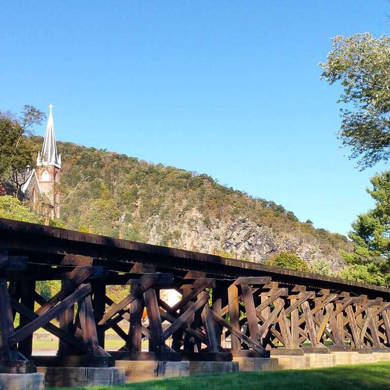 Here's your daily dose of #ColorWatch2015! We are standing close to the Shenandoah River shoreline, facing Maryland Heights. In the foreground, the old Winchester and Potomac railroad trestle (currently CSX) passes through Lowertown. In the 19th
