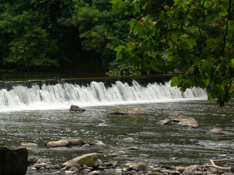 Brandywine Creek (also called the Brandywine River). The river runs through the Hagley Museum and Library(Wilmington, DE) the former  Du Pont gunpowder mills. The water of the river was used to supply energy to the workshops.