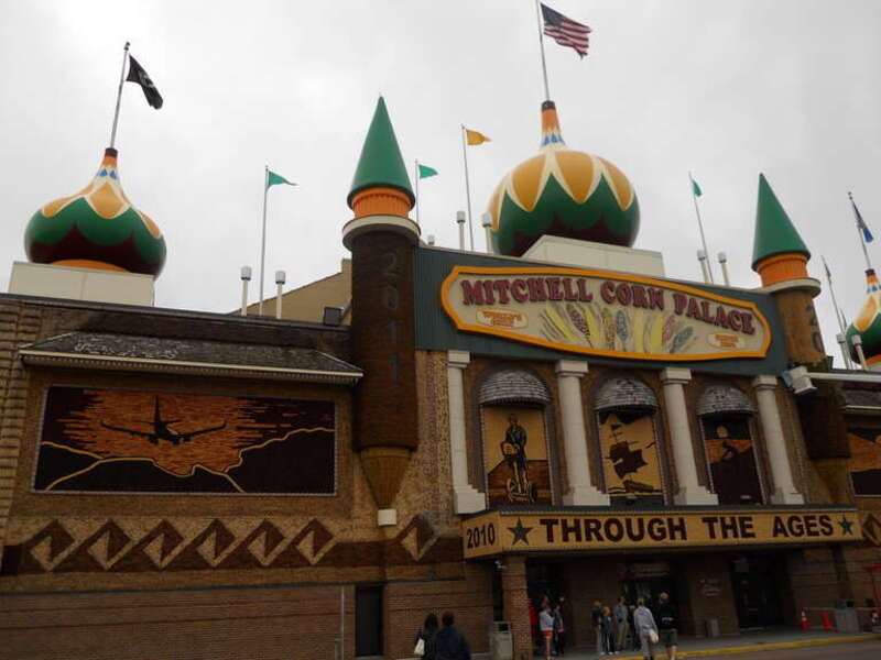 The original Mitchell Corn Palace (known as "The Corn Belt Exposition") was built in 1892 to showcase the rich soil of South Dakota and encourage people to settle in the area. It was a wooden castle structure on Mitchell's Main Street. In 1904–1905,