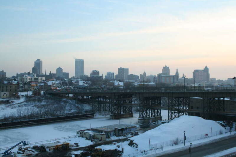 A shot of the Milwaukee skyline as seen from Glover Avenue above the Beerline B Neighborhood.  Along the river you can see construction on The Edge condos and apartments.