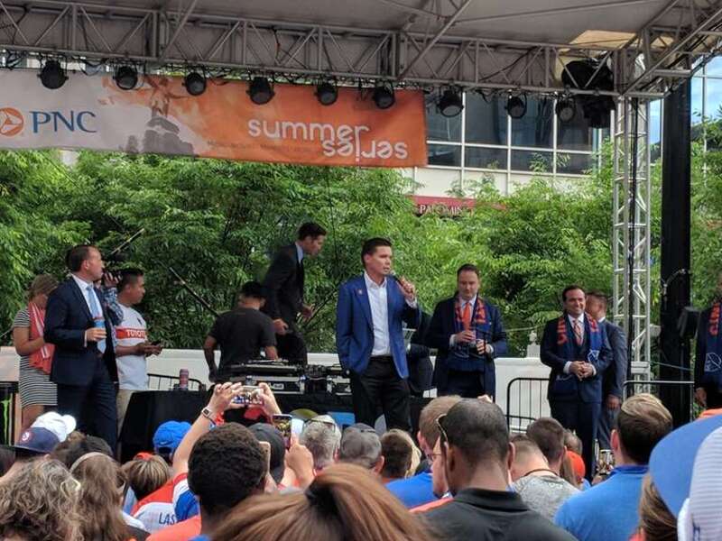 This photo was taken at an FC Cincinnati (FCC) event at Rhinegeist Brewery in Over-the-Rhine, Cincinnati, Ohio, USA on May 29, 2018. At the event, Major League Soccer commissioner Don Garber officially awarded an MLS franchise to FCC. Other speakers