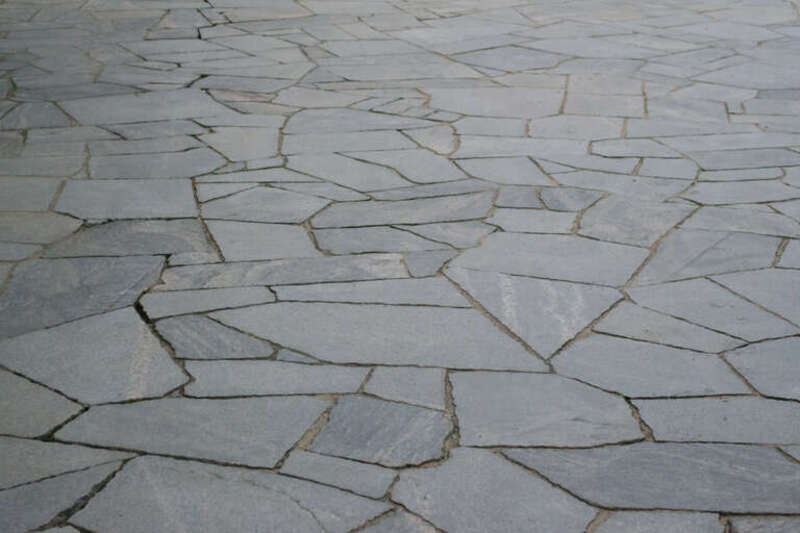 Very smooth, tight joints on crazy paving at Walden Pond beach.