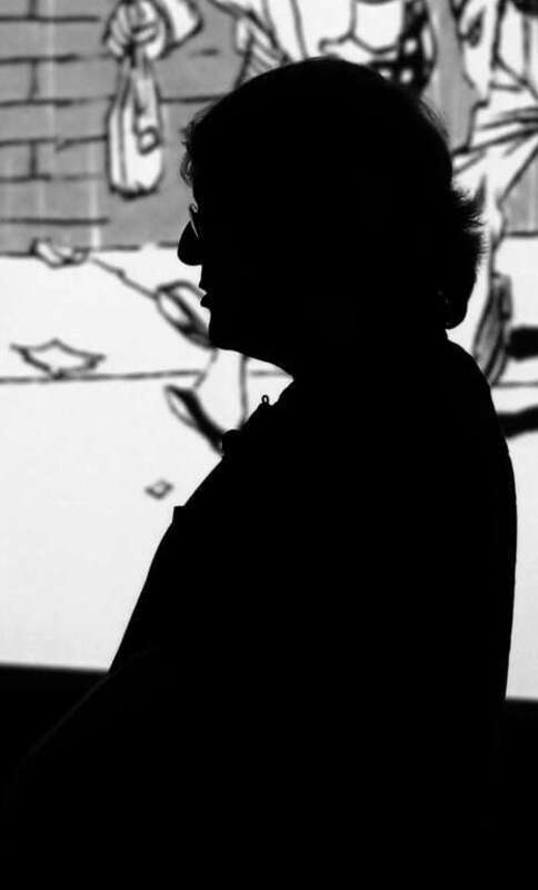 An image that I captured of Scott McCloud while he lectured at the University of Louisville.  Projected art by Will Eisner.