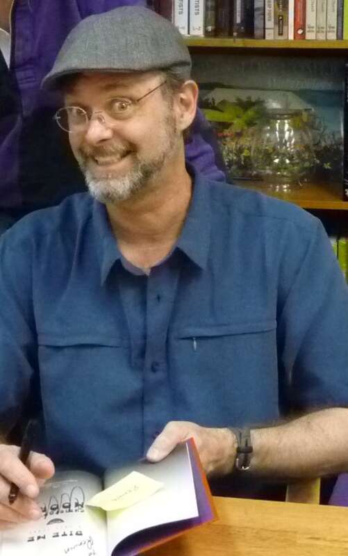 Author Christopher Moore signing his book "Bite Me" at the Politics and prose bookstore in Washington, DC.