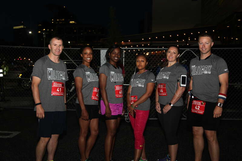 ATLANTA, July 4, 2015 - Georgia National Guard Soldiers participate in the Peachtree Road Race to help raise money to start a new running program for military children with the Atlanta Track Club's Kilometer Kids. 

(Georgia National Guard photo by