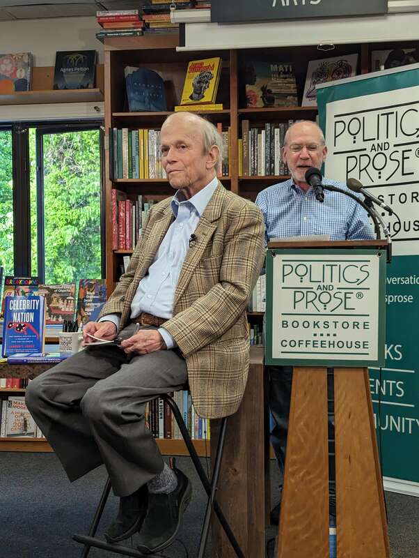 Journalist Landon Jones being introduced for a book talk at Politics and Prose.