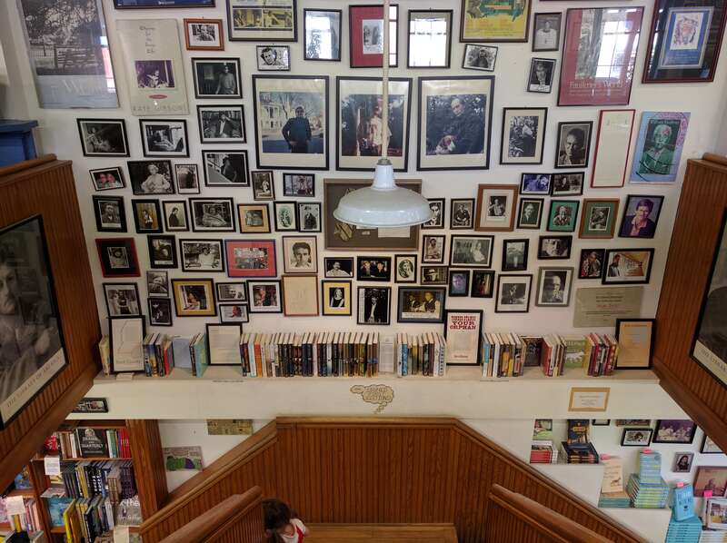 Square Books in Oxford, Mississippi, August 2016.  Signed photos and signed first edition books above the stairs.