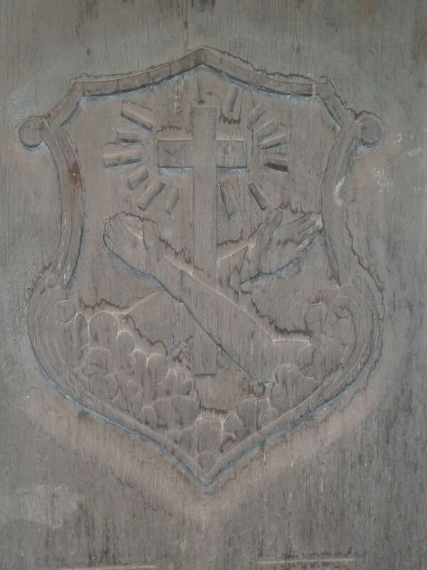 Franciscan Coat of Arms on a church door at the Indian Pueblo Cultural Center, Albuquerque, NM