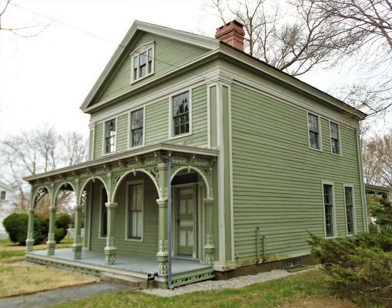 The George Greenman House at 47 Greenmanville Avenue in Mystic, Connecticut was built in 1839 in the Greek Revival style for George Greenman, the oldest of three brothers who founded the George Greenman &amp; Co. shipyard. The porches with their