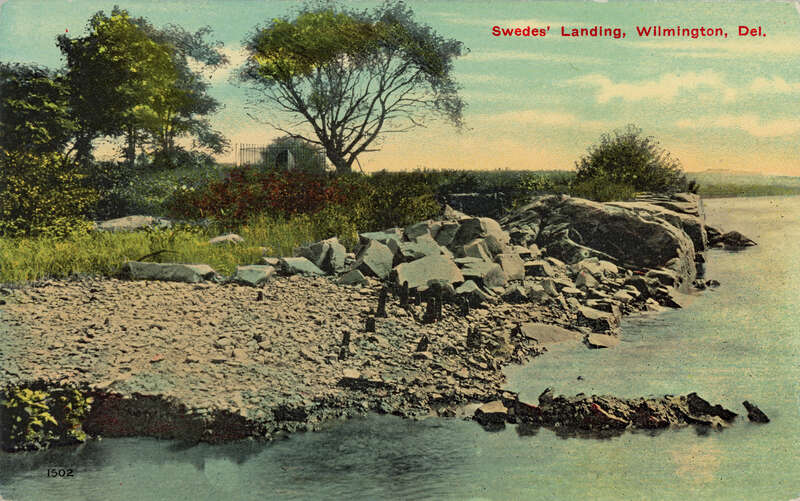 Front of a postcard with an early 20th century photograph of Swedes' Landing (also known as "The Rocks") along the Christina River in Wilmington, Delaware. This is the area where the ships Kalmar Nyckel and Fogel Grip arrived in March 1638 carrying