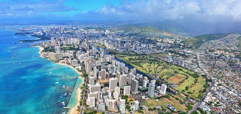 Waikiki and Honolulu from a doors off ride with Genesis Aviation Helicopter Tours.