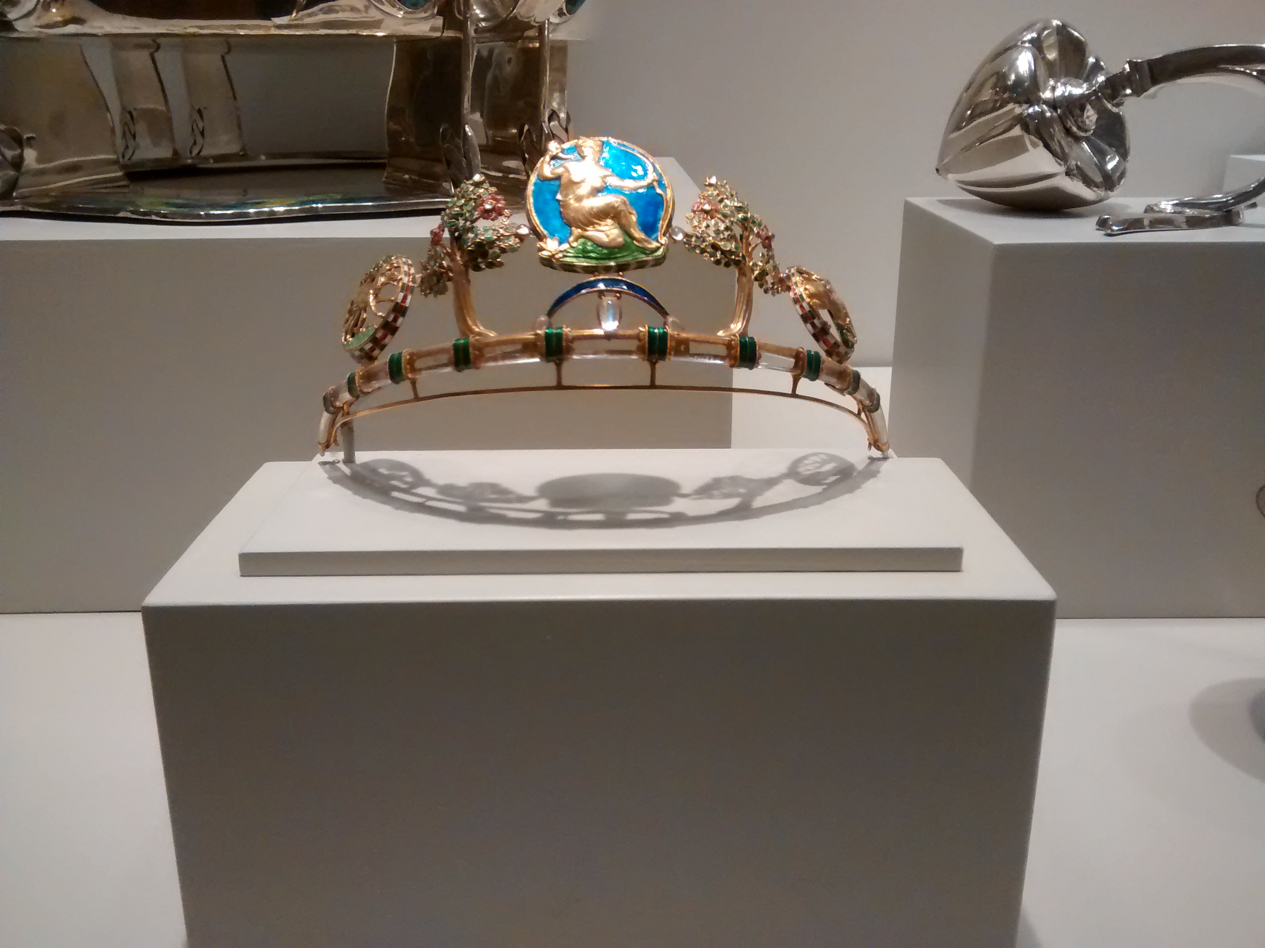 Description from the Art Institute of Chicago: "Diana" Diadem, c. 1908. England, London. Henry Wilson (English, 1864–1934). Enameled gold, rock crystal, moonstones, and sapphires.
