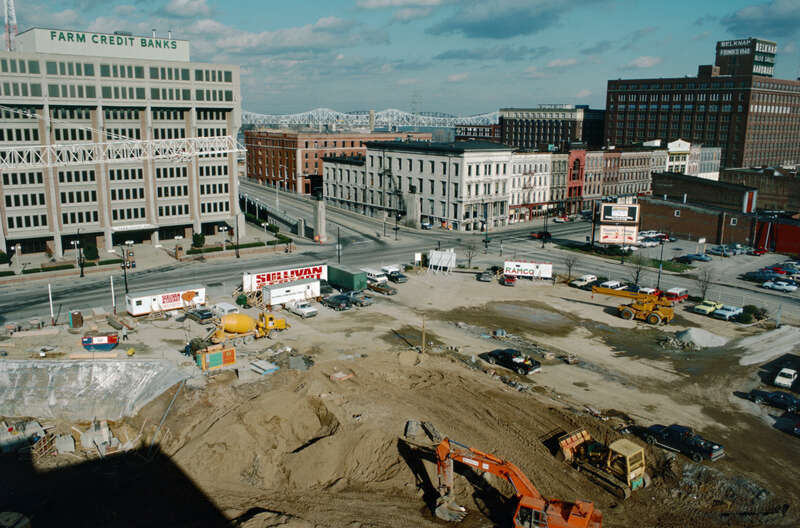 Looking NE from roof of <a href="http://www.levybuilding.com/History.aspx" rel="nofollow">Levy Building</a> at NE corner of 3rd and Market Sts.
In foreground, construction of foundation of One Corporate Plaza at SE corner of 3rd and Main