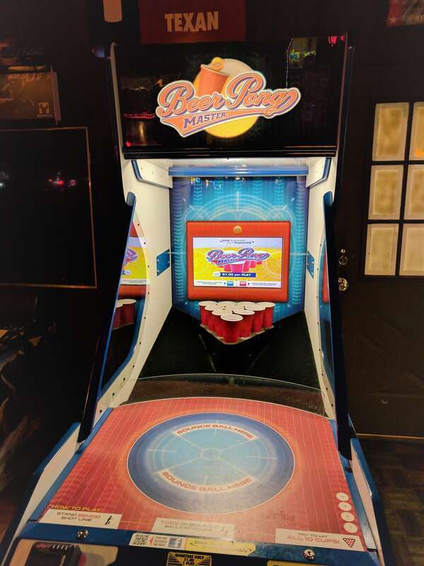 A beer pong arcade game machine at a nightclub in Texas, US.