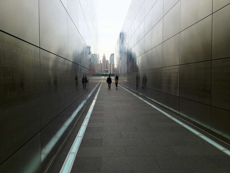 September 11 memorial at Liberty State park in Jersey City, NJ. There is a slight reflection of the freedom tower on the right wall. The name of the memorial is "Empty Sky." There are a total of 756 names on the walls. Listed are New Jersey residents