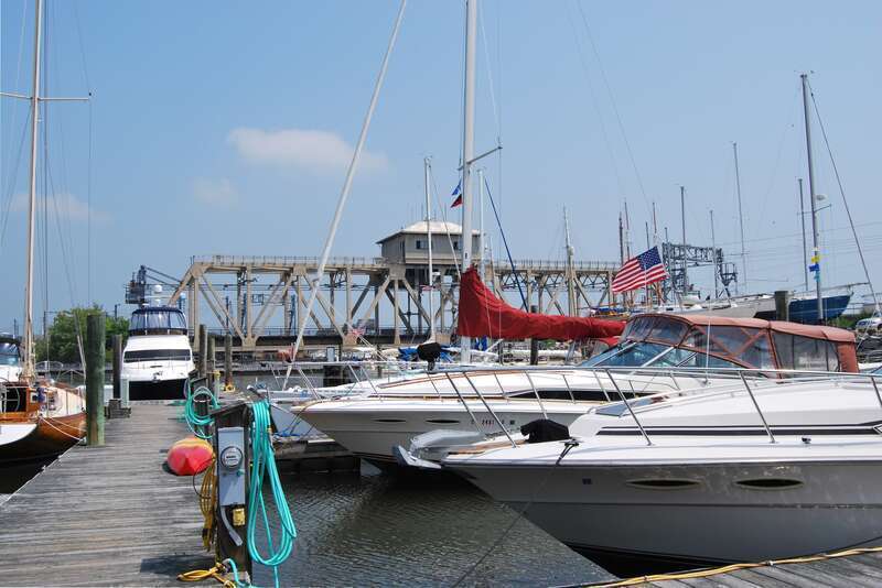 Marina in the Mystic River at Mystic, Connecticut, with the Mystic River Railroad Bridge in the background.