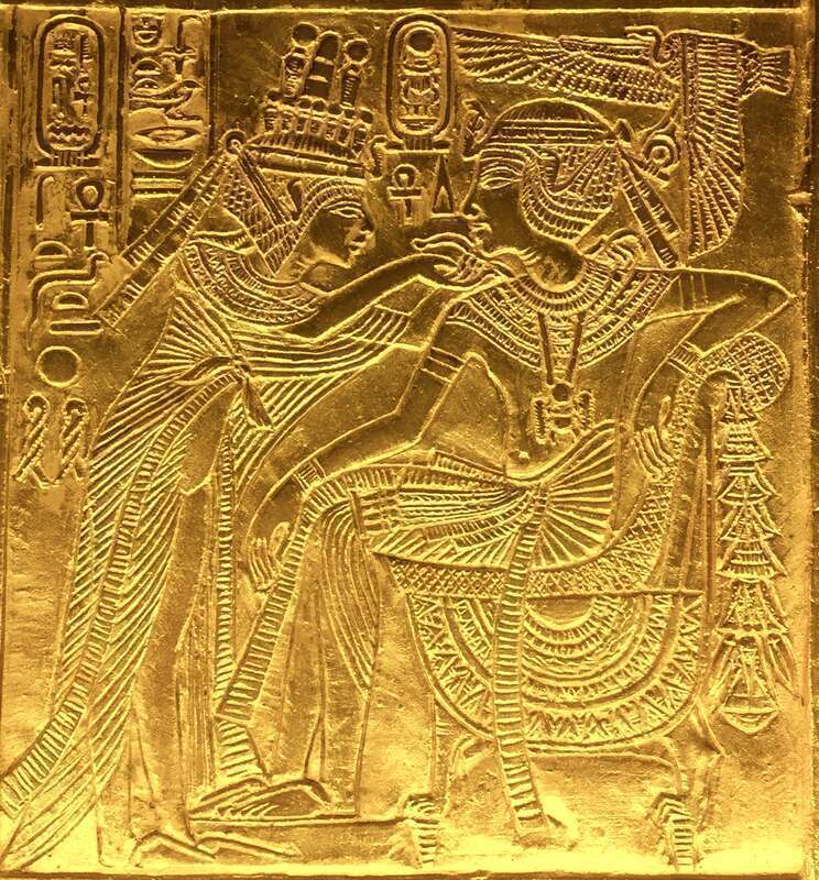 Scene from gilded shrine of Tutankhamen showing him and his wife Queen Ankhesenamun
