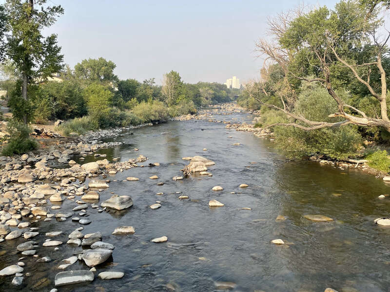 Also smoke from nearby fires.  It's the lowest I've seen the river it in the five years I've lived here.
The Truckee is fed by a dam at its source at Lake Tahoe, so the water level can be regulated.  This year's drought was predicted earlier in the