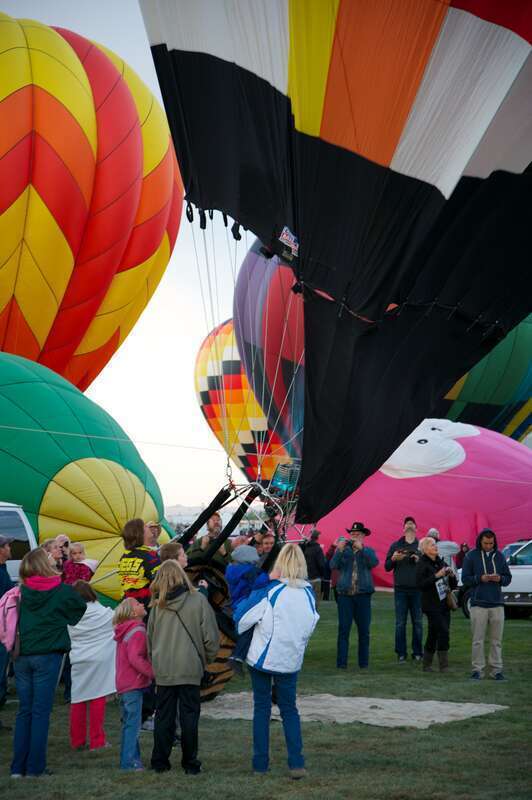 So much fun on how close you can get to the action of putting up a balloon. Albuquerque International Balloon Fiesta, 2012. Over 750 ballons on site.