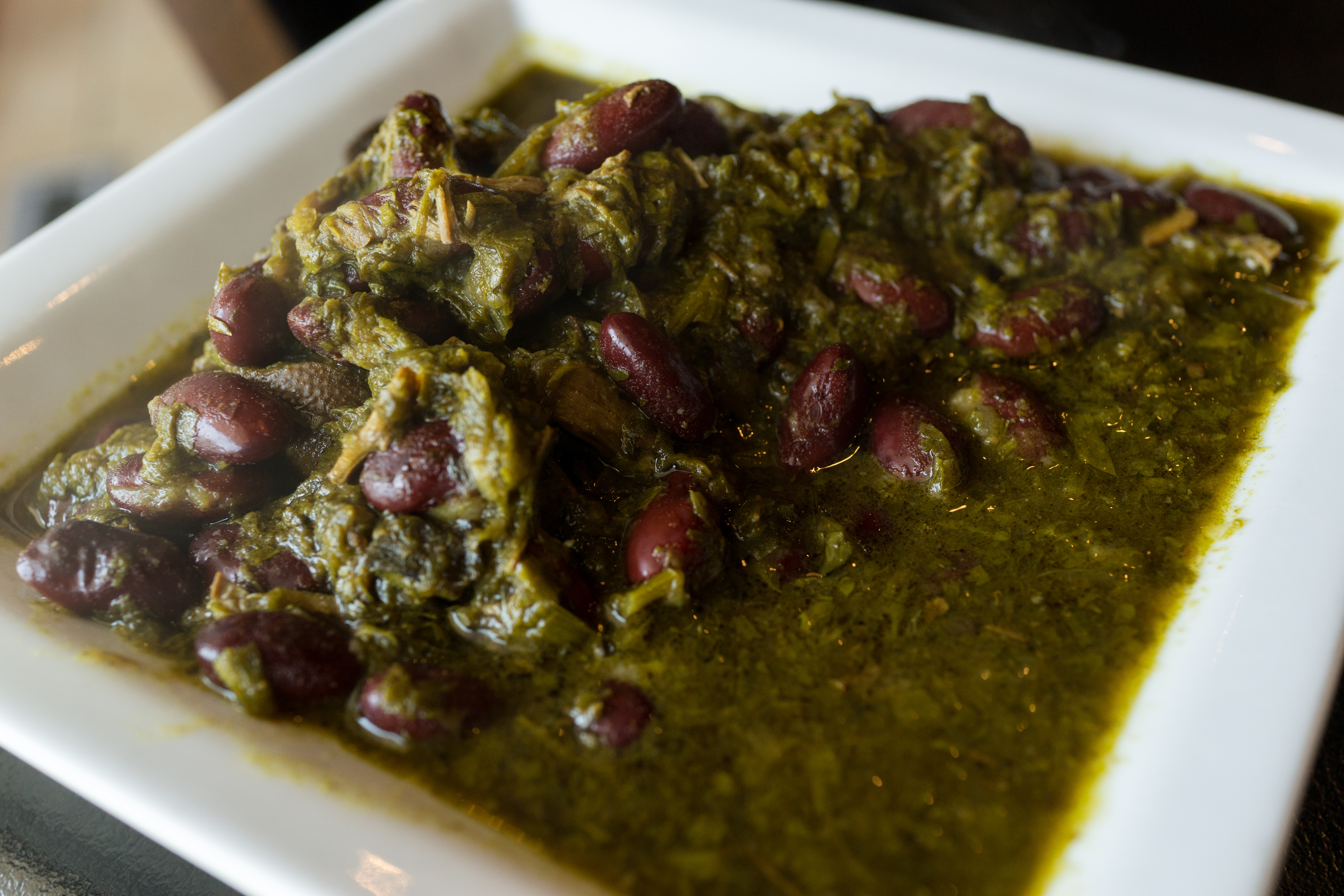 Ghormeh Sabzi made with sautéed herbs, beef tenderloin, red kidney beans, flavored with dried limes from Saffron's Persian Cuisine, Louisville, KY