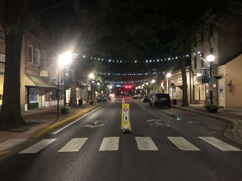 Night view eastward along Loockerman Street at Bradford Street in Dover, Kent County, Delaware