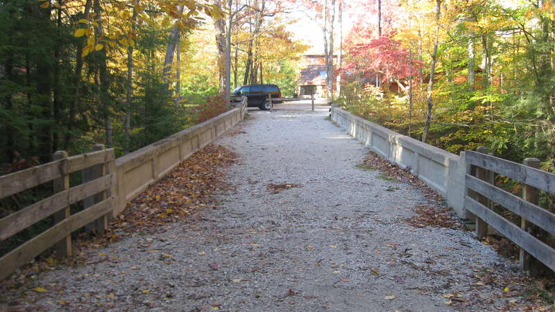 Looking northward on the Old Highway Bridge, a footbridge that once carried State Road 47 over Turkey Run; although the bridge has not moved, it is now located in Turkey Run State Park, just south of the Turkey Run Inn in Sugar Creek Township, Parke