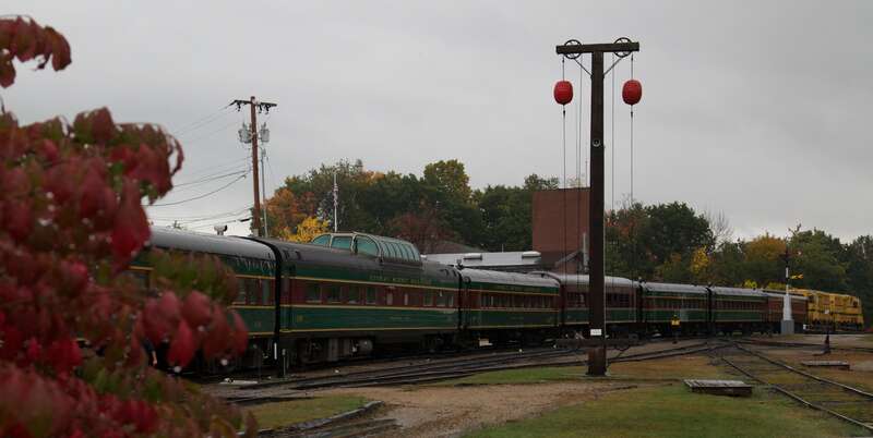 This old signal is in the North Conway station of the railroad.  If the balls are high, there are no orders await them at the station (or any other reason to slow) and they are free to "highball" through town.  Note the semaphore signals to the far