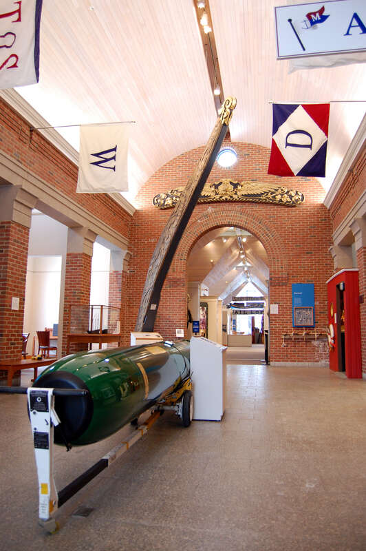 With ship owners' house flags, bow and stern carvings and USN Mark 40 torpedo hull.