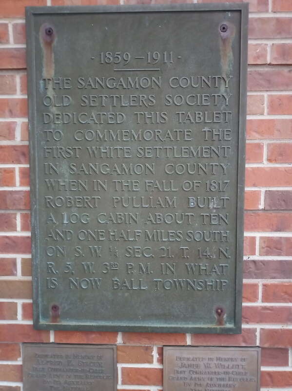 Plaque memorializing "first white settlement" in Sangamon County in 1817, placed near Old State Capitol by Sangamon County Old Settlers Association.