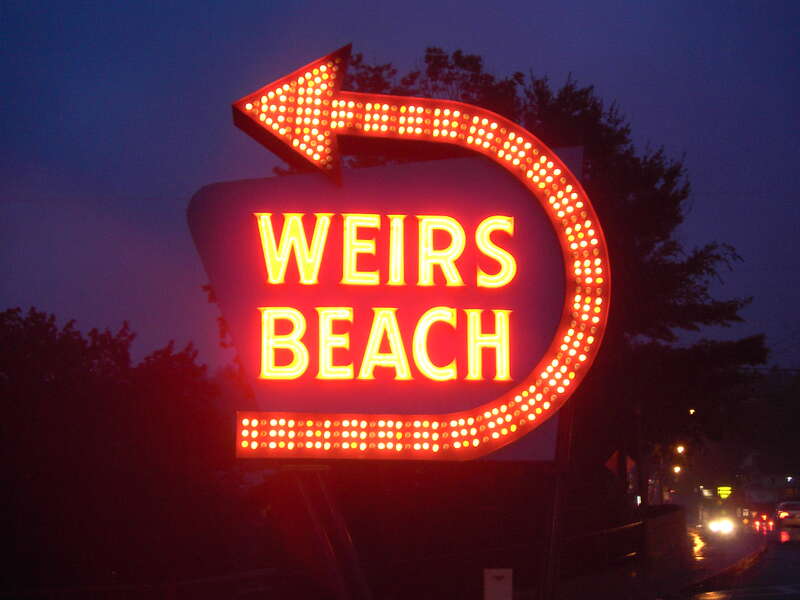 The Weirs Beach sign, located at the entry of Weirs Beach, New Hampshire since the 1950's.