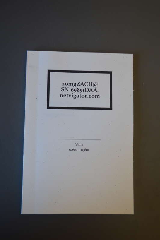 A white book with the title "zomgZACH@SN-69891DAA.netvigator.com", and a subtitle "Vol 1: 2/10—3/10". It is a piece of work produced in Paul Soulellis' Experimental Publishing Studio 2016 by Zach Deocadiz.